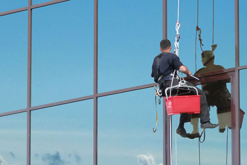 Worker Washing Windows